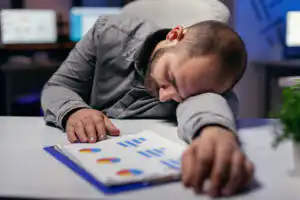 overworked hardworking businessman resting head tablet workaholic employee falling asleep because while working late night alone office important company project overworked hardworking businessman resting head tablet workaholic employee falling asleep because while working late night alone office important company project